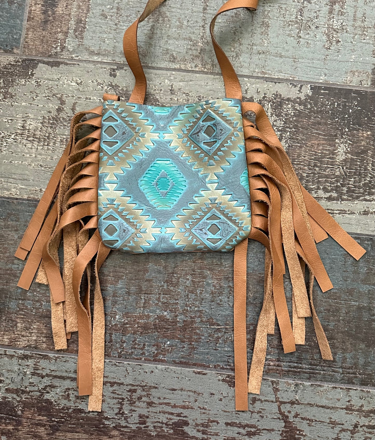 COWHIDE & FRINGE PURSE